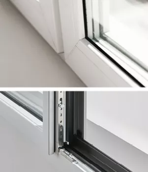 Fenêtre en PVC glisse ouverte, montrant son cadre blanc et mécanisme coulissant en métal, située dans une pièce lumineuse.